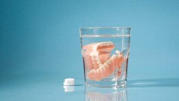 denture with water